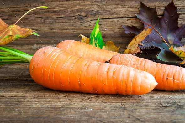 carrots on a wooden background (Misc) Photo Download