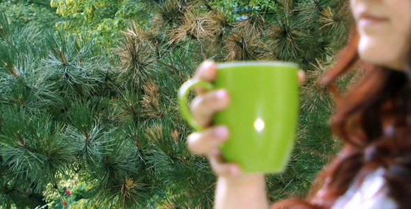 Young Girl Drinking Coffee and Nature Young Girl Drinking Coffee and Nature