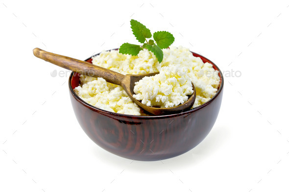 Curd in wooden bowl with spoon and mint (Misc) Photo Download