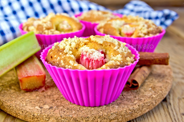 Cupcakes with rhubarb in tins on board (Misc) Photo Download