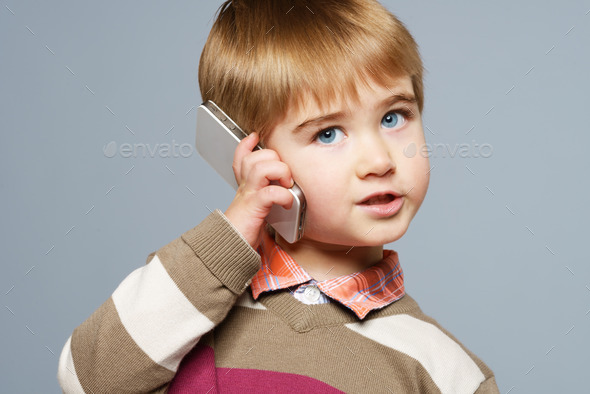 Little boy with mobile phone (Misc) Photo Download