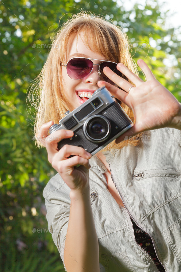 Young woman taking photos
