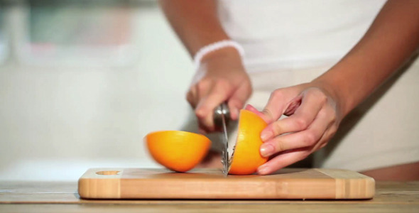 Girl Cutting Orange Girl Cutting Orange