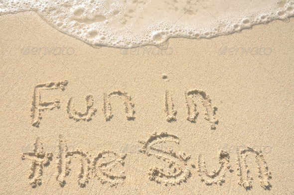 Fun in the Sun Written in Sand on Beach