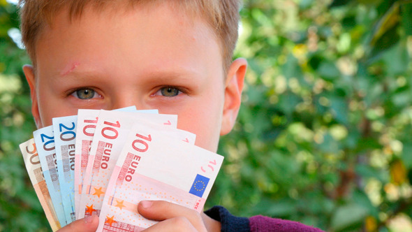 Boy Smelling Euro Notes 2 Boy Smelling Euro Notes 2