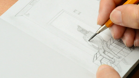 Sketcher Drawing in a Book Sketcher Drawing in a Book
