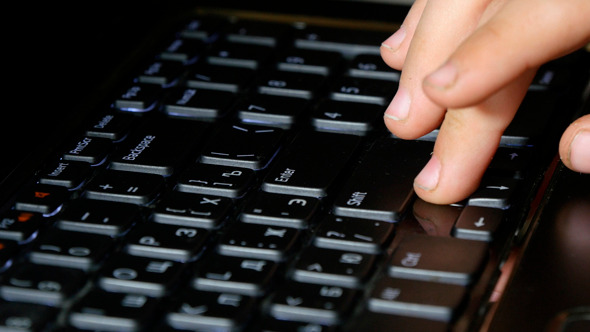 Little Boy Play Video Game By One Hand On Keyboard Little Boy Play Video Game By One Hand On Keyboard