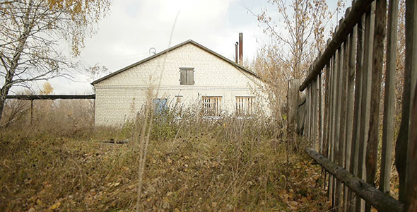 Wooden Fence And Abandoned Village Building Wooden Fence And Abandoned Village Building