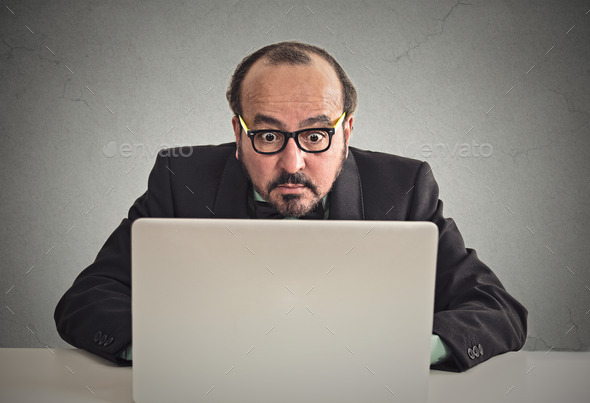 man looking concentrated on computer screen (Misc) Photo Download