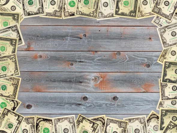 Frame from the dollars on the wooden board background (Misc) Photo Download