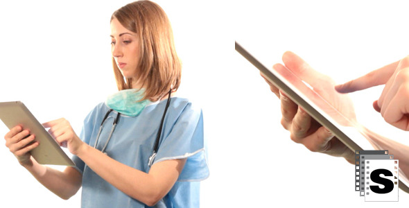 Female Surgeon Using Tablet Female Surgeon Using Tablet