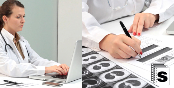 Doctor Using Laptop And Keeps Notes Female Doctor Using Laptop And Keeps Notes Female