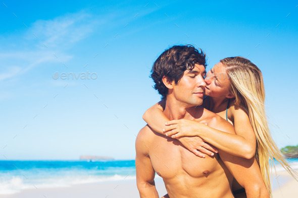 Couple Kissing on Tropical Beach (Misc) Photo Download