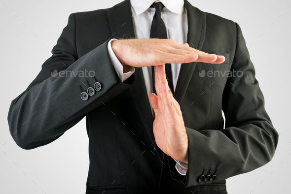 Businessman Showing Time Out Hand Sign (Misc) Photo Download