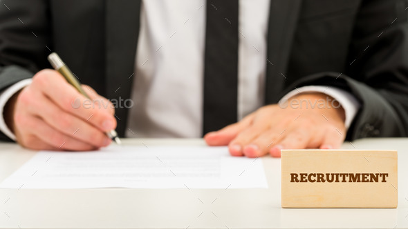 Applicant completing a job application (Misc) Photo Download