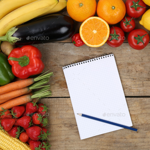 Shopping list with fruits and vegetables on a wooden board