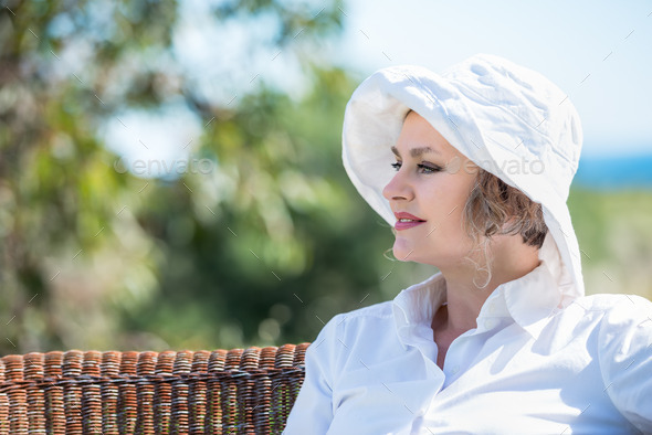 Woman sitting in the garden (Misc) Photo Download