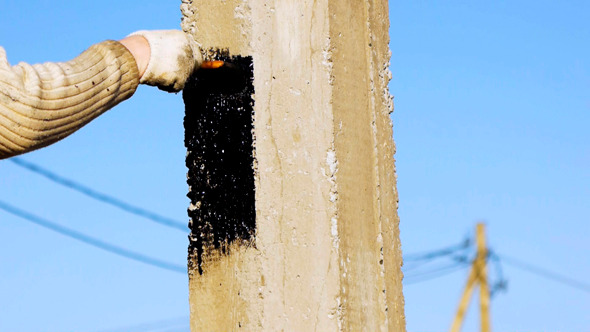 VideoHive Water-Proofing A Pile With Bitumen Tar Mastic 9526947 VideoHive Water-Proofing A Pile With Bitumen Tar Mastic 9526947