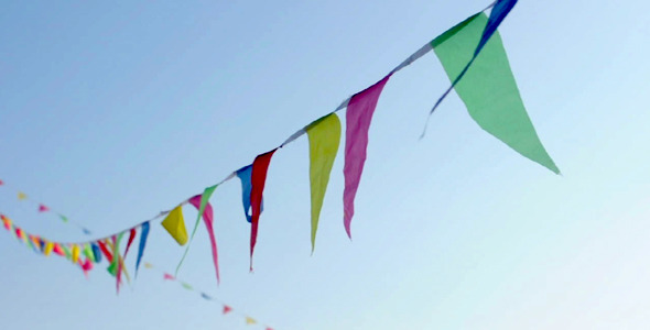 Multicolored Striped Triangular Flags On A Rope Multicolored Striped Triangular Flags On A Rope