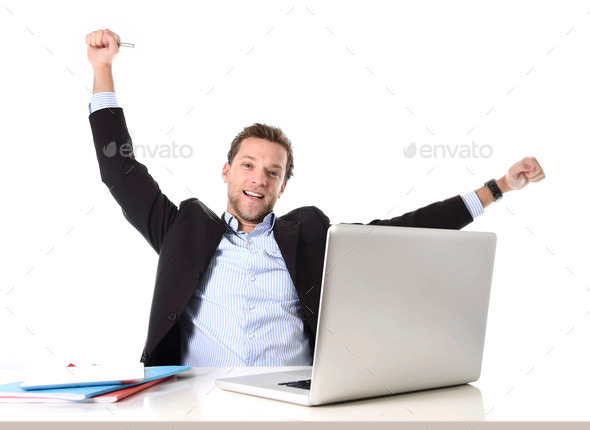 young attractive businessman happy and at office work sitting at computer desk satisfied celebrating (Misc) Photo Download