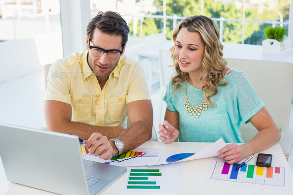 Creative design team during brainstorming in the office (Misc) Photo Download