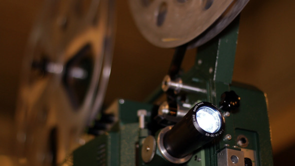 Film Projector Projecting 16mm Movie Film Projector Projecting 16mm Movie