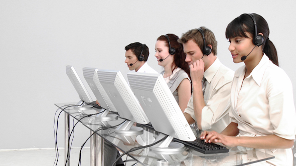 Multiethnic Business People Working in a Call Center Multiethnic Business People Working in a Call Center