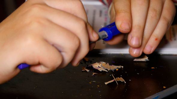 VideoHive Little Boy Sharpening Pencils 9640498 VideoHive Little Boy Sharpening Pencils 9640498