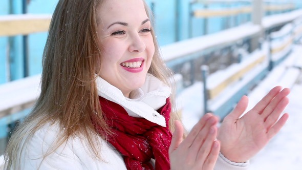 Young Woman Cheering at an Empty Stadium in Winter Young Woman Cheering at an Empty Stadium in Winter