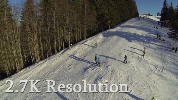 VideoHive Flying over Skiers on Snowy Slope 4 9643812 VideoHive Flying over Skiers on Snowy Slope 4 9643812