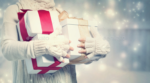 Woman holding many present boxes (Misc) Photo Download
