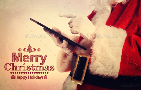 Santa Claus with tablet (Misc) Photo Download