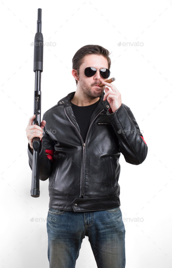 Man in black leather jacket and sunglasses with shotgun (Misc) Photo Download
