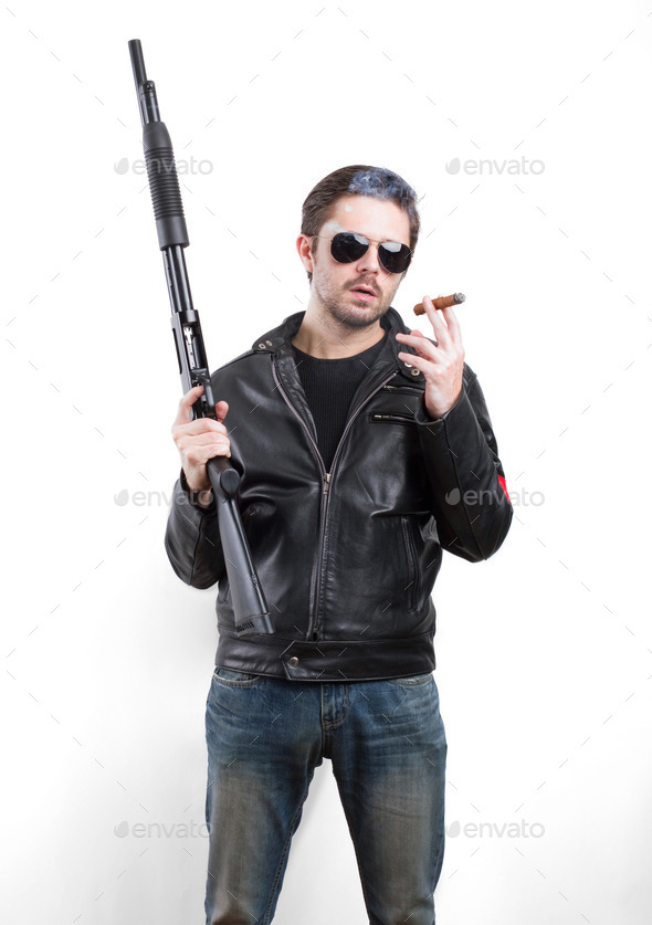 Man in black leather jacket and sunglasses with shotgun (Misc) Photo Download
