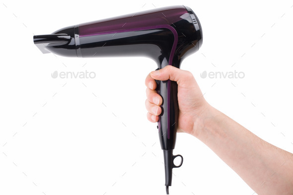 Violet hairdrier in hand on a white background (Misc) Photo Download