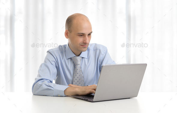 businessman working on his laptop (Misc) Photo Download