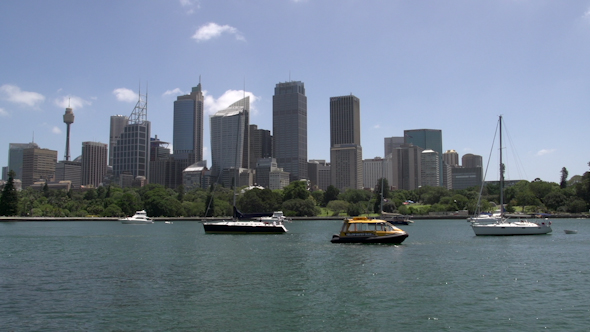 VideoHive Sail Boats And Small Water Taxi In Front Of Sydney Skyline 9706301 VideoHive Sail Boats And Small Water Taxi In Front Of Sydney Skyline 9706301