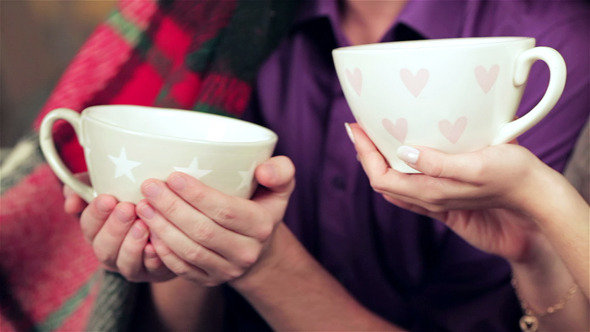VideoHive A Loving Couple Holding Cups And Drinks At Christm 9713059 VideoHive A Loving Couple Holding Cups And Drinks At Christm 9713059