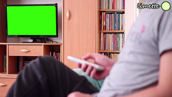 VideoHive Watching TV Green Screen 9714943 VideoHive Watching TV Green Screen 9714943
