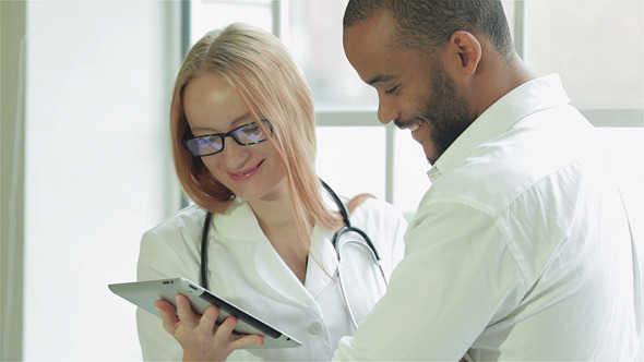VideoHive A Patient With A Doctor See The Results Of Analyze 9725173 VideoHive A Patient With A Doctor See The Results Of Analyze 9725173