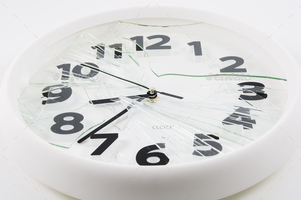 White clock is broken glass isolated
