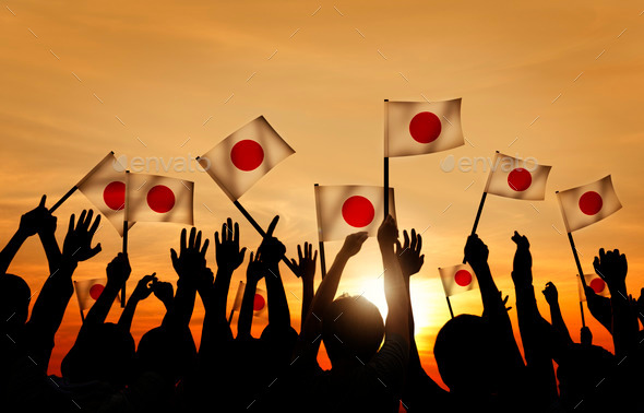 Silhouettes of People Holding the Flag of Japan (Misc) Photo Download