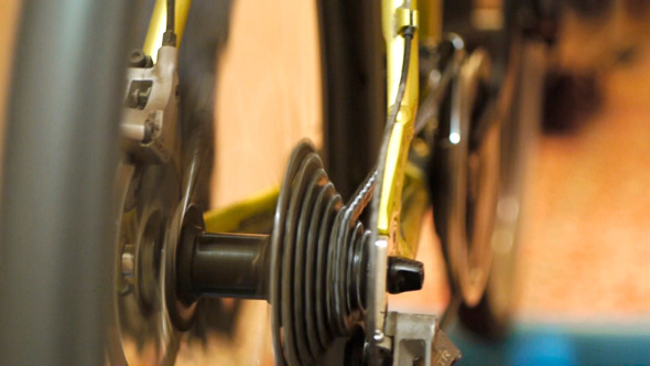 Man Training On Sport Machine In Fitness Club Man Training On Sport Machine In Fitness Club