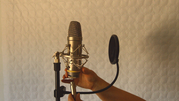 Woman Connects Studio Microphone Woman Connects Studio Microphone
