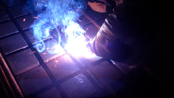 Worker Welding Armature With Electric Welder Worker Welding Armature With Electric Welder