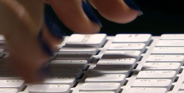 Woman Hand is Writing on Notebook Computer 2 Woman Hand is Writing on Notebook Computer 2