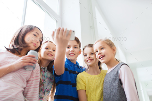 group of school kids with smartphone and soda cans (Misc) Photo Download