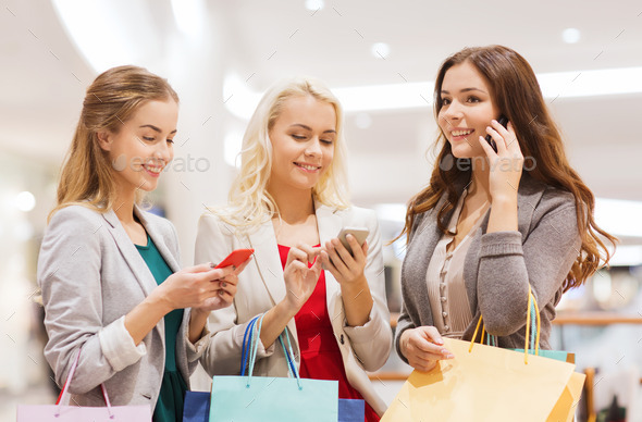 happy women with smartphones and shopping bags (Misc) Photo Download
