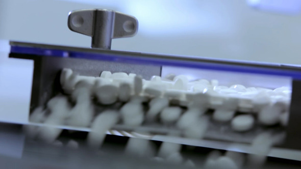 Tablets on Conveyor Pharmaceutical Factory 2 Tablets on Conveyor Pharmaceutical Factory 2