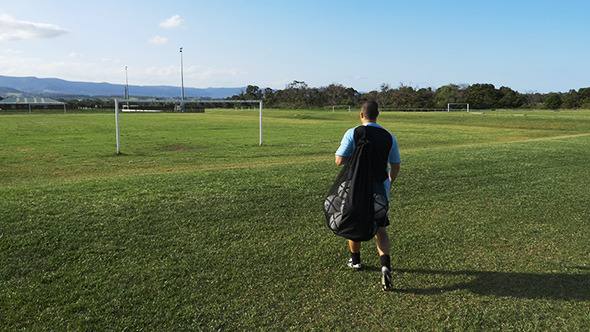Football Soccer Player Walking to the Fields Football Soccer Player Walking to the Fields